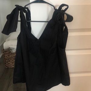 Black tank top with ties on shoulder